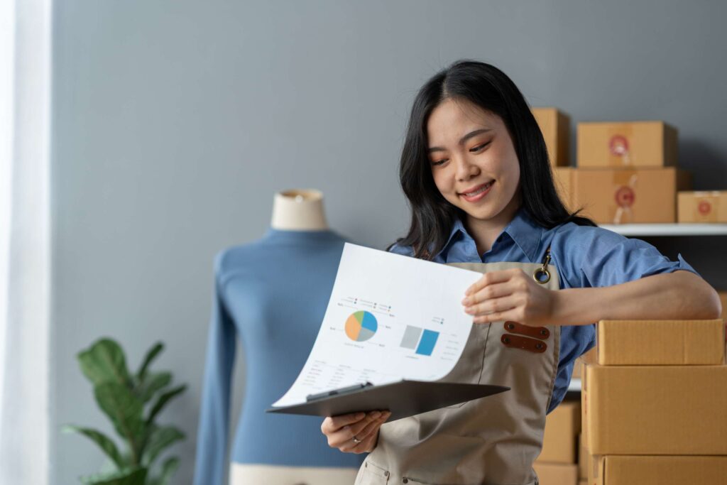 Businesswoman with shop statistics